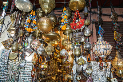 Low angle view of decoration hanging at market stall