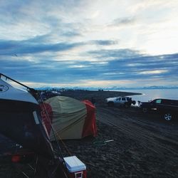 Tent on beach against sky