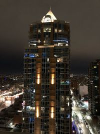 High angle view of buildings at night