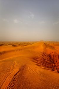 Scenic view of desert against sky