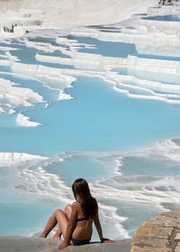 Woman enjoying at sea shore