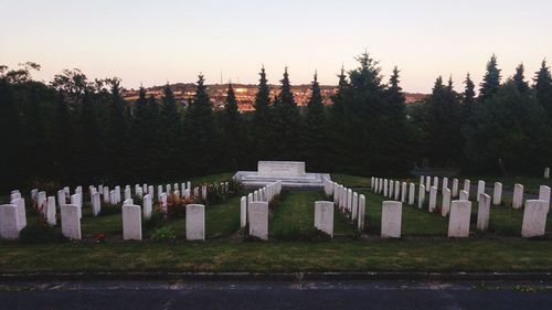 View of cemetery against sky at sunset