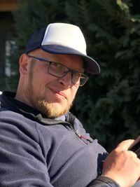 Portrait of young man wearing hat