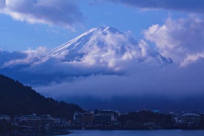 Scenic view of harbor against sky