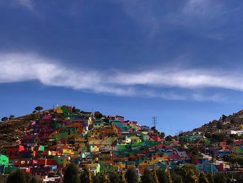 Buildings in city against sky