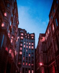 Low angle view of buildings at night