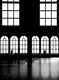 Silhouette of building at railroad station