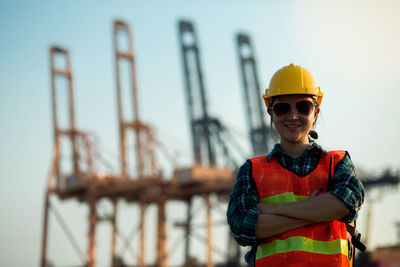 Portrait of smiling man standing outdoors