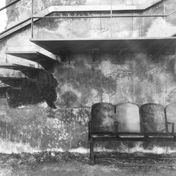 Empty bench in abandoned building