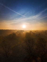 Scenic view of landscape against sky during sunset