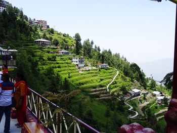 Panoramic view of buildings in city against sky