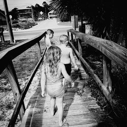 High angle view of friends on boardwalk