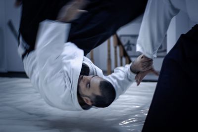 Side view of a young man dancing