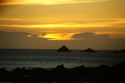 Scenic view of sea against sky during sunset