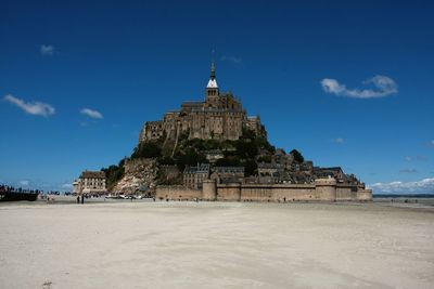 Exterior of temple against blue sky