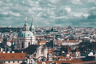 Aerial view of city against sky