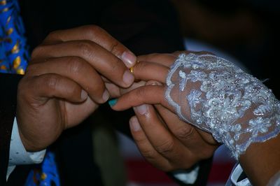 Cropped image of couple with wedding ring