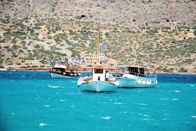 Boats in calm sea