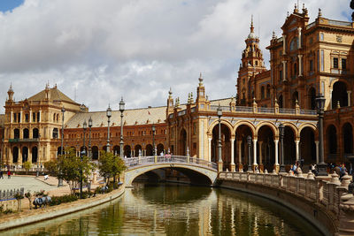 Arch bridge over canal in city