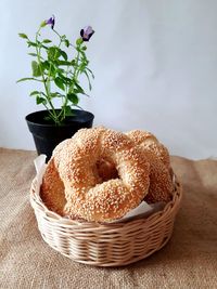 Close-up of donuts in basket on table