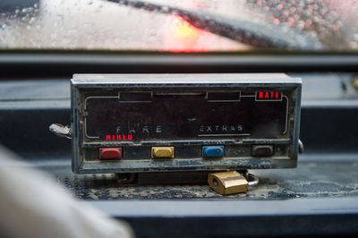 Close-up of taximeter in car