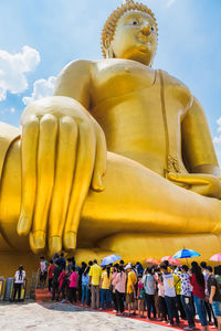 Low angle view of statue against sky