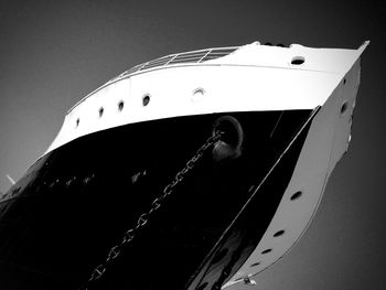 Close-up of ship moored on wall