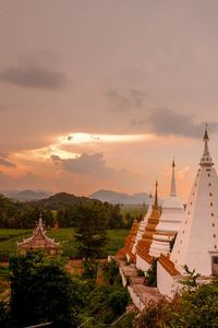 Panoramic view of buildings against sky during sunset