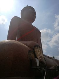 Low angle view of statue against sky