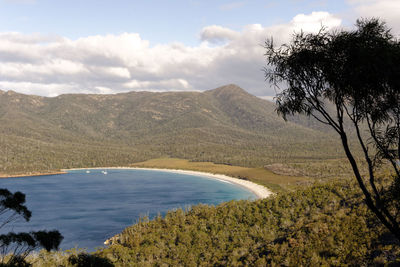 Scenic view of wineglass bay against sky
