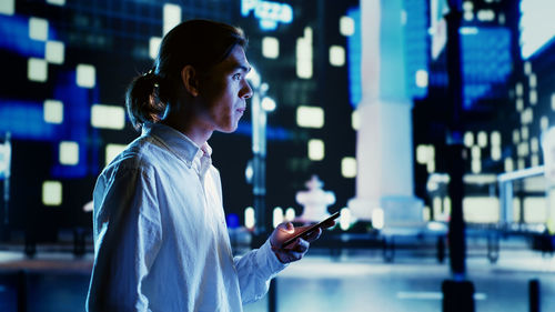 Young man using mobile phone