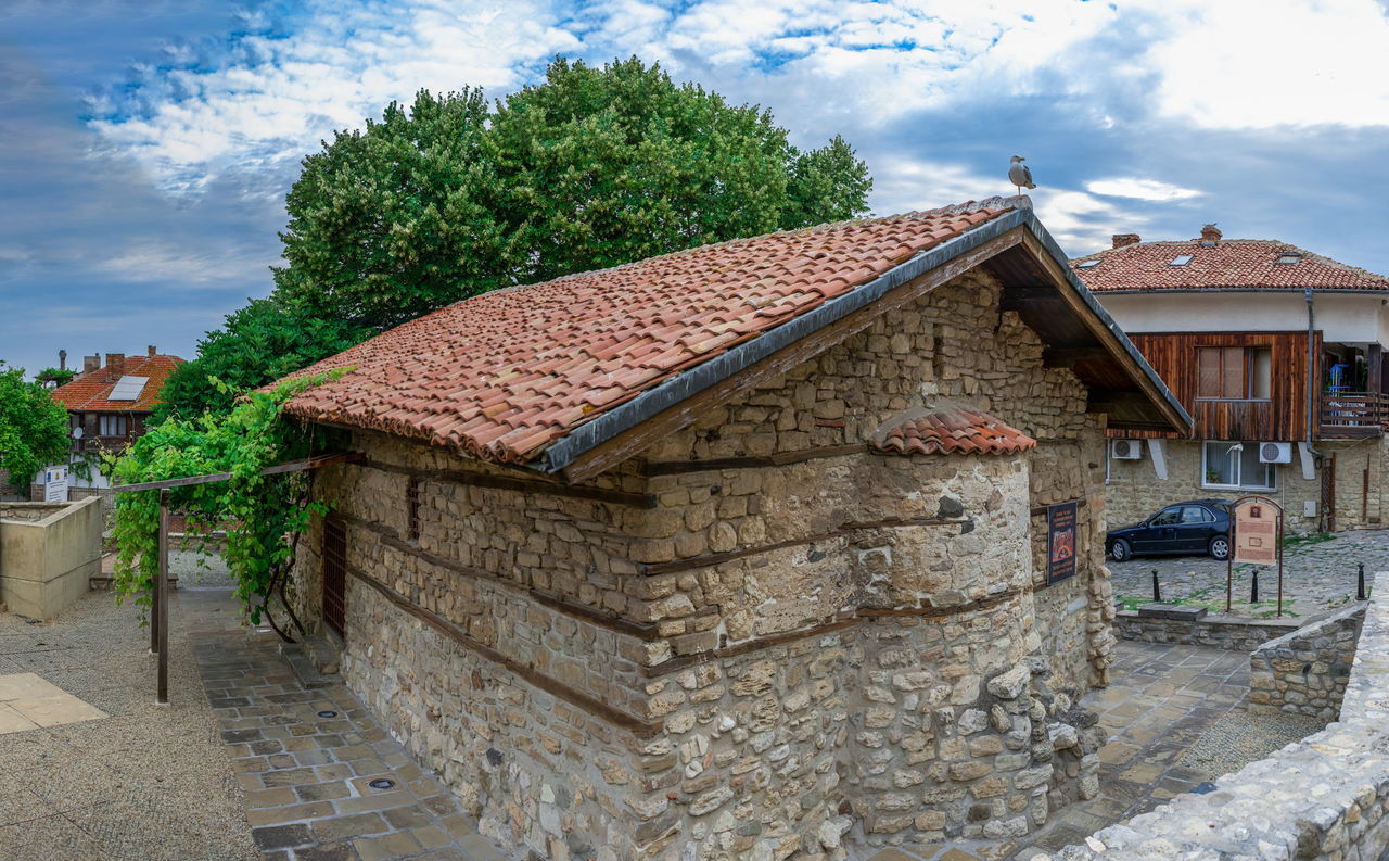 OLD BUILDING AGAINST SKY