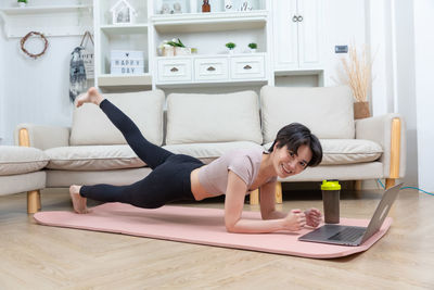 Woman exercising in gym