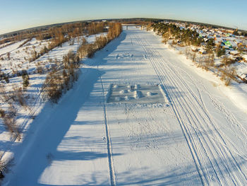 Snow covered beach against sky