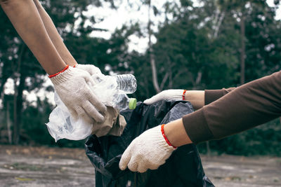 Close-up of hand holding umbrella