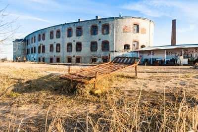 Abandoned building against sky