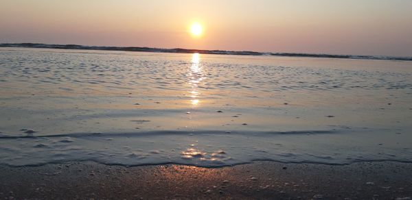 Scenic view of sea during sunset