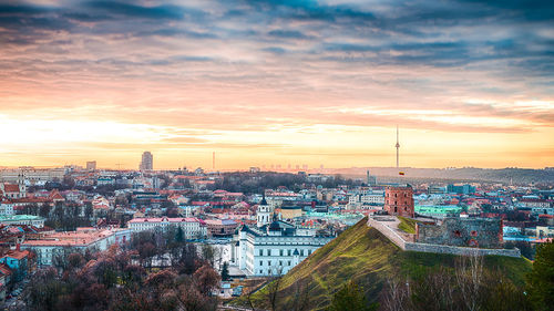 Close-up of cityscape against dramatic sky