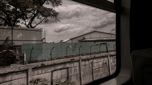 Panoramic view of train seen through window