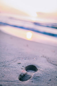 Scenic view of beach at sunset