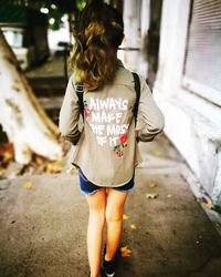 Rear view of woman walking outdoors