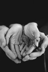 Close-up of woman holding hands