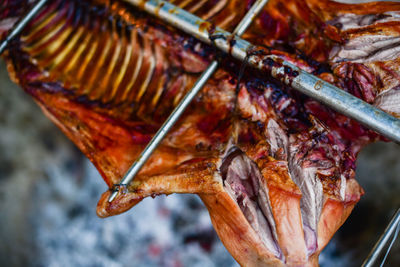 Close-up of meat on barbecue grill