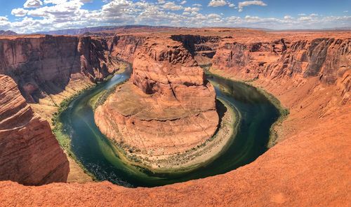 Aerial view of rock formations against sky