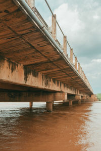 Pier over sea against sky
