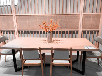 Empty chairs and table in restaurant
