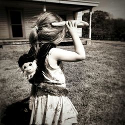 Girl playing with horse