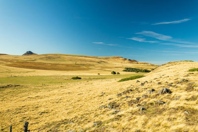 In the foreground of photography you can see the remains of fossilized volcanic stones 