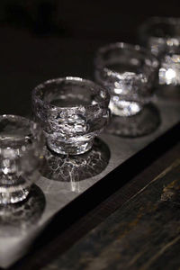 Close-up of glasses on table