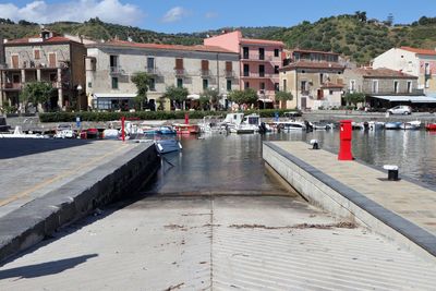 Canal amidst buildings in city